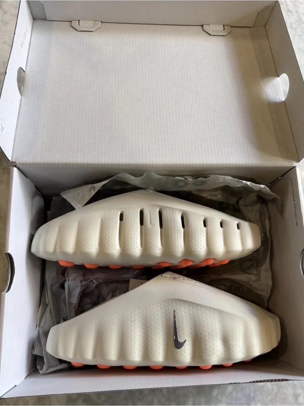 Nike Cream Foam Slip-On with Orange Outsole Accents